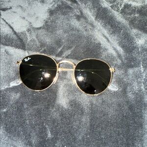 Ray-Ban round Gold Frame Sunglasses with Dark Lenses